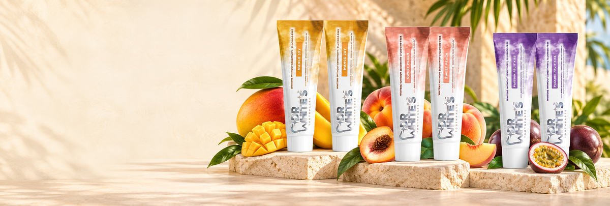 Mango Joy, Sweet Peach and Passion Fruit Kiss toothpaste arranged in same-flavor pairs.