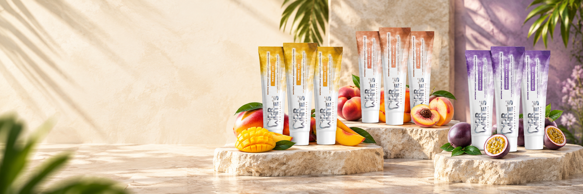 Mango Joy, Sweet Peach and Passion Fruit Kiss toothpaste arranged in same-flavor three-packs.
